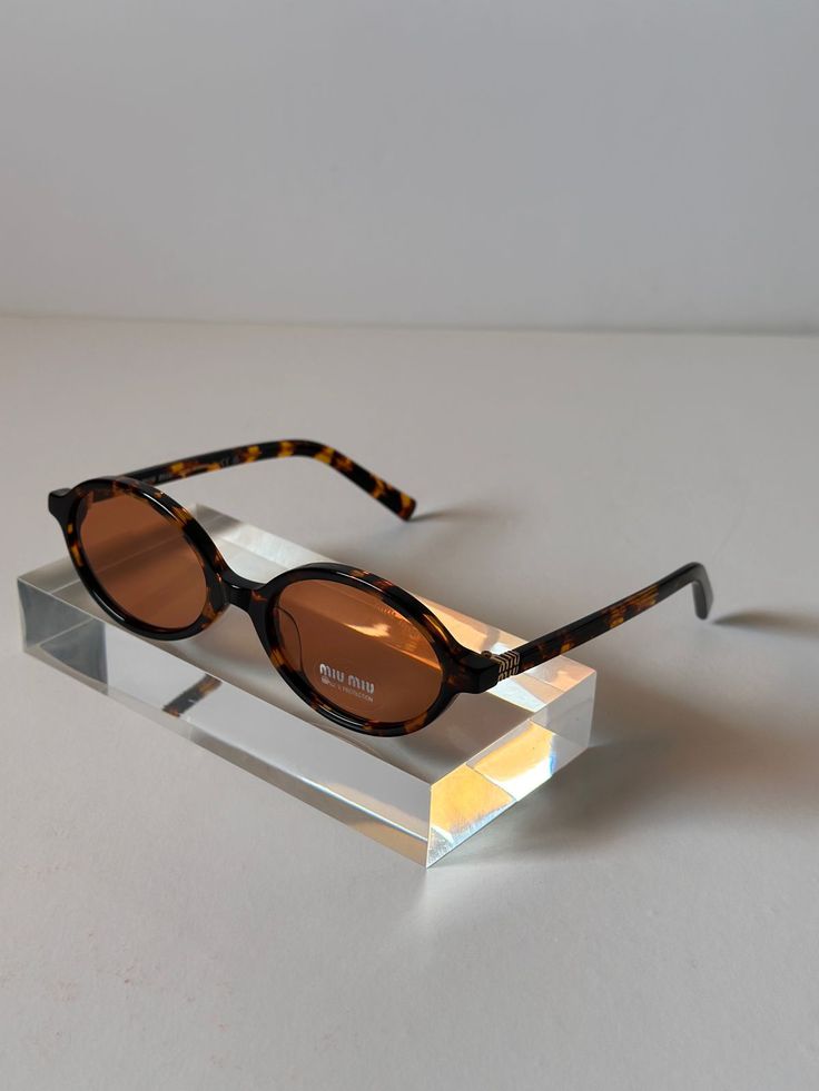 télécharger (59) LUNETTES MIU MIU – Image 1